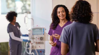 Healthcare professionals talking in healthcare setting