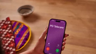 PD Telecare displays on a mobile phone showing that number is being called